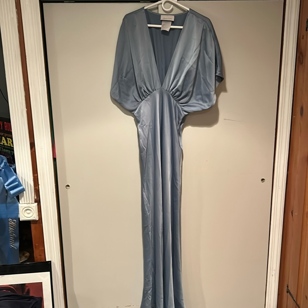 Evening gown, baby blue, gathered, draped, comfy feel. Worn to community event .